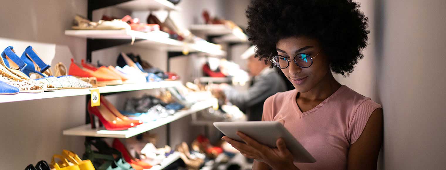 Person scrolling through tablet