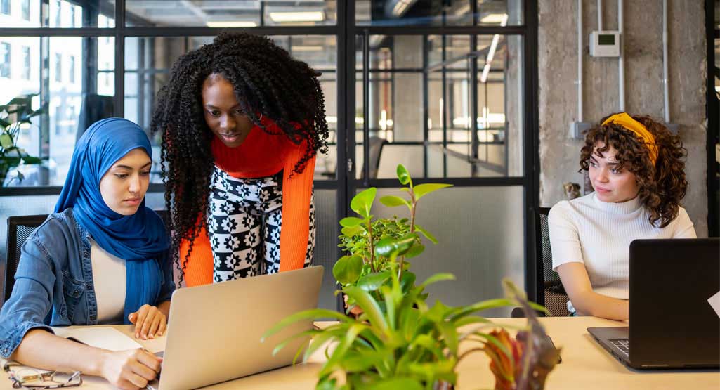 Women working at desk Women working at desk